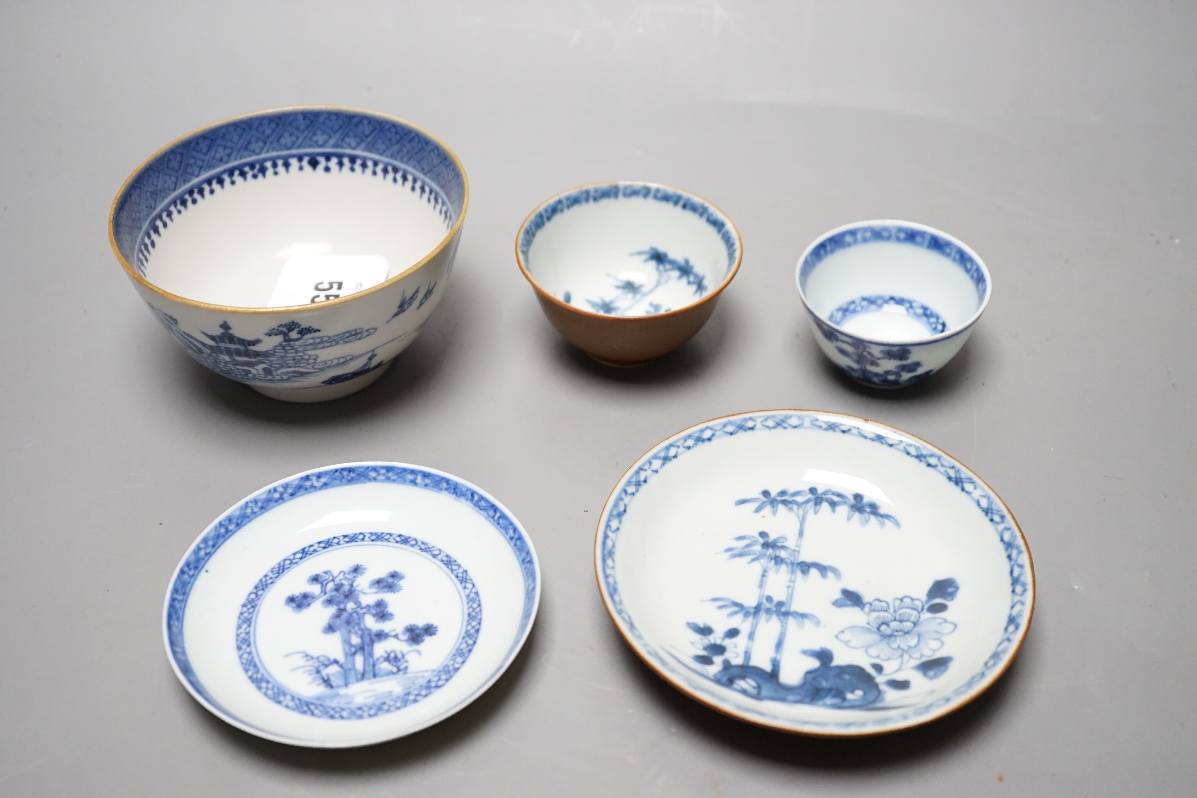 Two Chinese Nanking cargo teabowls and saucers and a Diana cargo sugar bowl, largest 12cm diameter